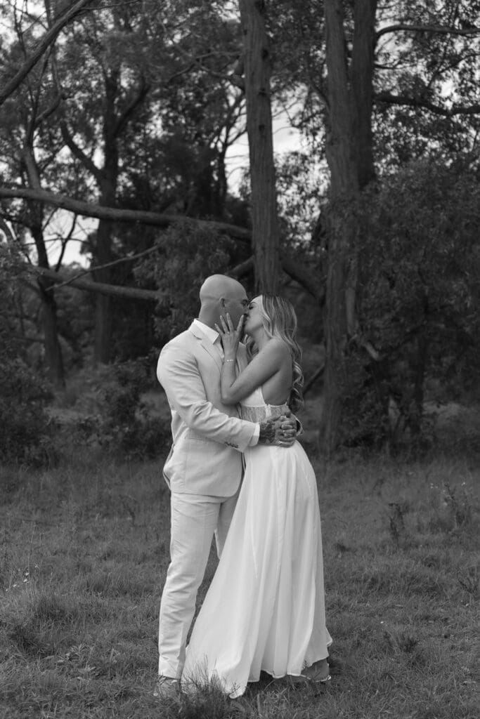 Couple kissing on their wedding day